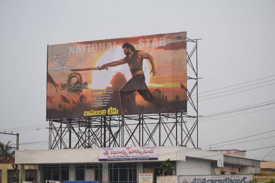 Fans make huge cutouts of Baahubali 2 stars Prabhas, Rana Daggubati and SS Rajamouli. Baahubali 2,Bahubali 2,Baahubali 2 cutouts,SS Rajamouli,Baahubali 2 stars,Prabhas,Rana Daggubati,S S Rajamouli