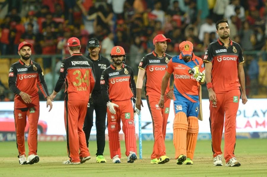 They had suffered a humiliating 82-run defeat against Kolkata Knight Riders (KKR) at the Eden Gardens on April 23 when they were bundled out for a mere 49 runs which is the lowest-ever total in the IPL's 10 year history. Gujarat registered their third win of this season to climb to the sixth position. They have six points from eight matches which include three wins and five defeats. Defending a modest total, the hosts were handed a glimmer of hope when West Indies leg-spinner Samuel Badree picket up wickets in consecutive overs. Badree struck the first blow for RCB in the third over when Ishan Kishan could not time his shot properly while attempting a sweep and was trapped plumb in front of the stumps. Brendon McCullum also did not last long as he was also dismissed by Badree. The New Zealand star stepped out to attempt a bit hit but miscued his shot only to be caught by A.B. de Villiers at long on. Royal Challengers Bangalore,Gujarat Lions,Gujarat Lions thrash Royal Challengers Bangalore,Indian Premier League,Indian Premier League 2017,IPL,IPL 10,IPL 2017,Chinnaswamy Stadium