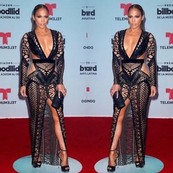 Jennifer Lopez bares all in a see-through crochet dress at the Billboard Latin Music Awards.