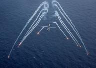 A U.S. Navy MH-60R Sea Hawk helicopter from the "Blue Hawks" of Helicopter Maritime Strike Squadron 78 fires chaff flares during a training exercise near the aircraft carrier USS Carl Vinson (CVN 70) in the Philippine Sea April 24, 2017. In a show of force, the United States is sending the USS Carl Vinson aircraft carrier group to waters off the Korean peninsula, where it will join the USS Michigan, a nuclear submarine that docked in South Korea on Tuesday. South Korea's navy has said it will hold drills with the U.S. strike group.
