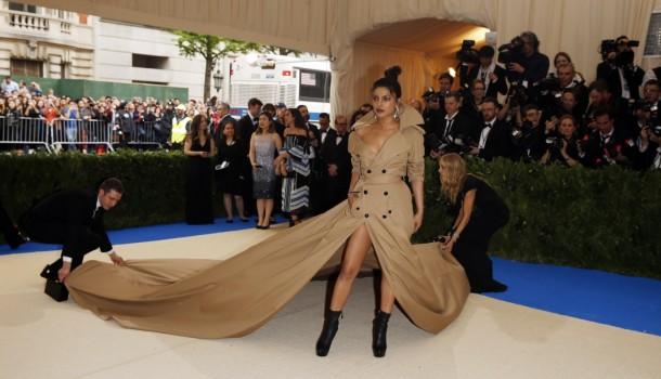 Bollywood actress Priyanka Chopra looked stunning in a Trench Coat dress with longest train ever 2017 Met Gala Red Carpet.