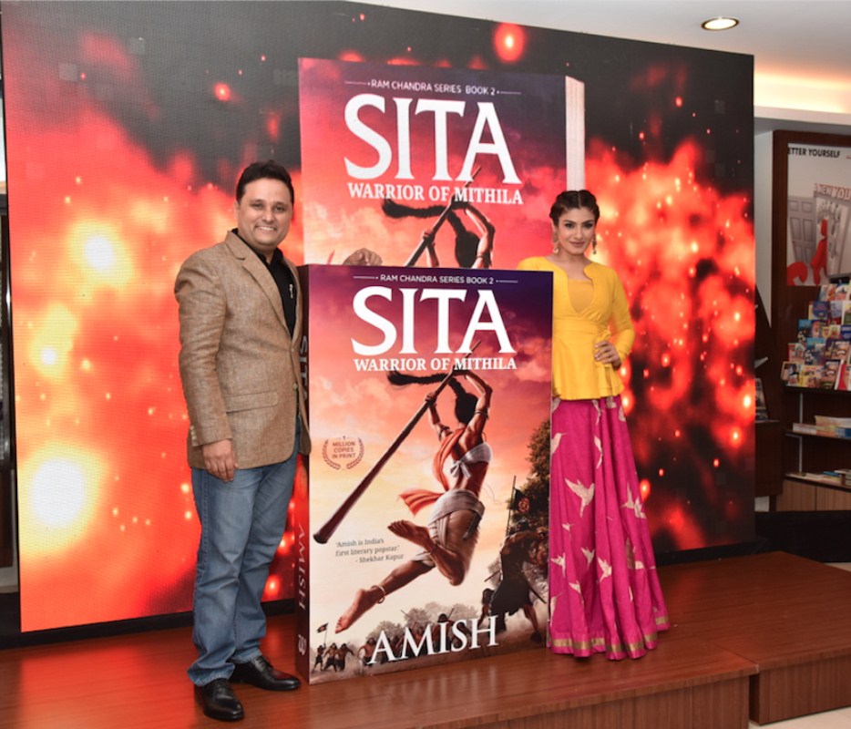 One of the most popular mythology writers of our times, Amish launched the book cover of his highly-awaited Book 2 in the Ram Chandra series - ‘Sita-Warrior of Mithila’ today. The cover launch of this thrilling adventure that chronicles the rise of Lady Sita was held at Title Waves Bookstore in Mumbai. At the book cover launch, the renowned author was accompanied by none-other-than the Bollywood Actress and Producer, Raveena Tandon. Amish and Raveena Tandon,Raveena Tandon,Sita- Warrior of Mithila,Ram Chandra series