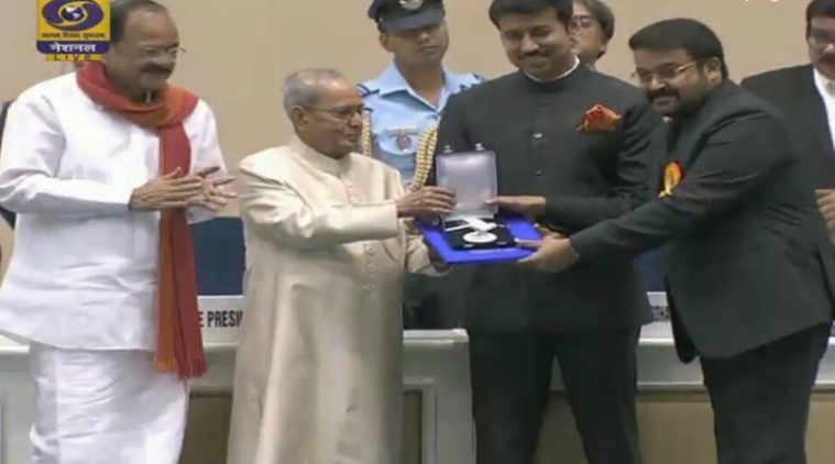 Actor Mohanlal receive Special Jury Award for Munthirivallikal Thalirkkumbol, Janatha Garage & Pulimurugan at 64th National Film Awards. National Film Awards 2017,National Film Awards,K Viswanath,Mohanlal,Akshay Kumar,Sonam Kapoor,Mohanlal,Pranab Mukherjee,President Pranab Mukherjee