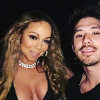 Mariah Carey flaunts her curves.