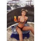 Love Island's Olivia Buckland flaunts her curves in swimsuit.