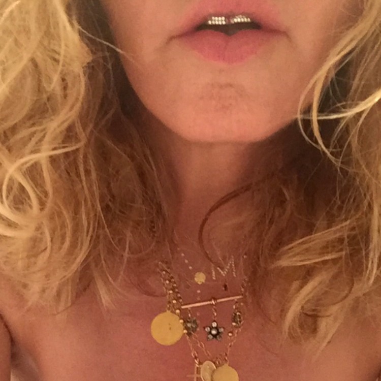 The 58 year-old, who shot to fame in the 1980s, did some skin show in a post on May 7, reports mirror.co.uk. In a image, she is seen wearing nothing but a gold necklace. Singer Madonna,Madonna,Madonna nude,Madonna sebastian,Madonna goes bold,Madonna nude pics,Madonna nude images,Madonna nude stills,Madonna nude pictures,Madonna nude photos
