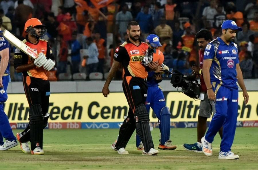 Punjab will have to win all of their remaining three games to be in the hunt for the play-offs. Hyderabad will travel to Kanpur to face Gujarat Lions in their final league game. Hence, going by their poor away record this edition, it was important for the David Warner-led side to win at home on Monday. Coming into the game on the back of two consecutive losses, they needed to raise their game and they did. Winning the toss and electing to bat, Mumbai initially struggled on a slower pitch and needed Rohit Sharma's sublime 67 off 45 deliveries to get to 138/7 in a crucial match for Hyderabad as far as play-offs chances are concerned. Mumbai's second-highest scorer was Parthiv Patel with 23. The classy stroke-maker that he is, Rohit was the only batsman who could take on against Siddharth Kaul (3/24), Bhuvneshwar Kumar (2/29), Mohammad Nabi (1/13) and Rashid Khan (1/22). Hyderabad captain Warner exploited the slowish nature of the wicket, as he introduced Afghan off-spinner Nabi in the second over and the latter gave no rooms for the Mumbai batsmen to go for shots. Sunrisers Hyderabad crush Mumbai Indians,Sunrisers Hyderabad beats Mumbai Indians,Sunrisers Hyderabad,Mumbai Indians,Indian Premier League,Indian Premier League 2017,IPL,IPL 2017