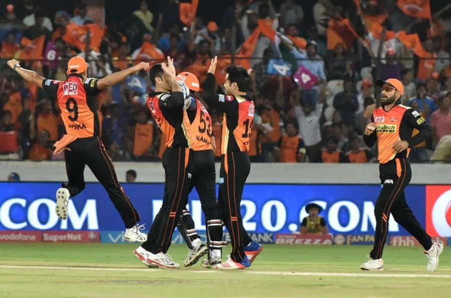 Having got a grip of the pitch, they stepped up the gear as Henriques employed hook and pull shots against medium pacers to good effect, while Dhawan used his feet and experience beautifully against the spinners, especially leg-spinner Karn Sharma. Having collected 40 runs in the next four overs, the left-right combo put the hosts in command, with only 56 required from 10 overs. The partnership was broken by paceman Jasprit Bumrah, who found a leading edge off Henrique and was holed out at short cover by Rohit. Dhawan, however, completed his half-century in 35 deliveries, as he drove Hyderabad near Mumbai's total. Yuvraj Singh (9) continued his inconsistent show as he drove a delivery from Malinga to Pandya at cover, with the home team at 112/3 in 14.4 overs. Dhawan and Vijay Shankar (15 not out) then saw the team home as Hyderabad posted their sixth win out of seven games at this stadium. Sunrisers Hyderabad crush Mumbai Indians,Sunrisers Hyderabad beats Mumbai Indians,Sunrisers Hyderabad,Mumbai Indians,Indian Premier League,Indian Premier League 2017,IPL,IPL 2017