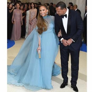 Jennifer Lopez looks like a queen donning a Valentino gown at the 2017 Met Gala.