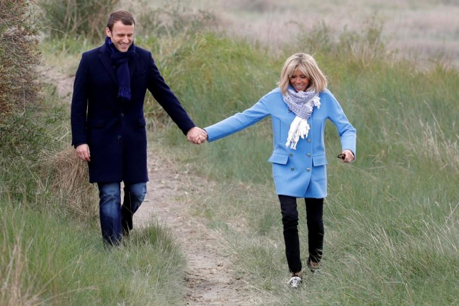 Emmanuel Macron and his wife Brigitte Trogneux pose the countryside in Le Touquet, France. Emmanuel Macron,Meet France's new First Lady,France First Lady,French President-elect Emmanuel Macron,Emmanuel Macron wife