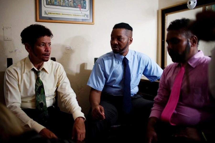 Niurca Perez (L), 52, who uses the artistic name Jean Carlos, chats backstage before performing at a trans party in Matanzas. The Mass was the highlight of a three-day conference on transsexuality and theology organized by the Matanzas-based Cuban branch of the international Metropolitan Community Church. Transgender,transgender Mass,Cuba hosts first transgender Mass,transgender pastors