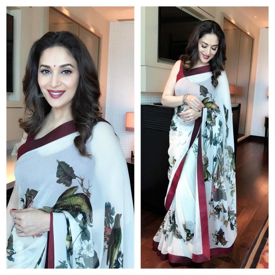 Actress Madhuri Dixit with Dr. Shriram Nene and Videocon d2h Head Marketing Sugato Banerji at the launch of new value added service of Videocon d2h on May 10, 2017. Madhuri Dixit,actress Madhuri Dixit,Dr. Shriram Nene,Videocon d2h,Marketing Sugato Banerji,Sugato Banerji,Madhuri Dixit pics,Madhuri Dixit images,Madhuri Dixit stills,Madhuri Dixit pictures,Madhuri Dixit photos