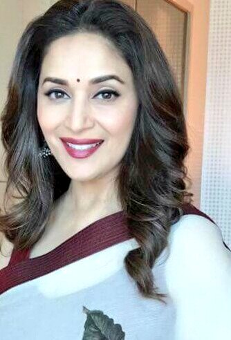 Actress Madhuri Dixit with Dr. Shriram Nene and Videocon d2h Head Marketing Sugato Banerji at the launch of new value added service of Videocon d2h on May 10, 2017. Madhuri Dixit,actress Madhuri Dixit,Dr. Shriram Nene,Videocon d2h,Marketing Sugato Banerji,Sugato Banerji,Madhuri Dixit pics,Madhuri Dixit images,Madhuri Dixit stills,Madhuri Dixit pictures,Madhuri Dixit photos