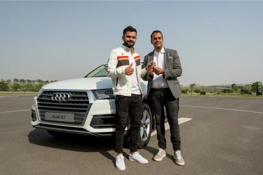 Audi, the German luxury car manufacturer, today, welcomed the Captain of the Indian national cricket team Virat Kohli into the Audi Q family by adding another ‘quattro’ muscle into his fleet; Mr. Rahil Ansari, Head, Audi India handed over the keys of the SUV icon Audi Q7 45 TDI in Carerra White colour to the National Cricket icon Virat Kohli.