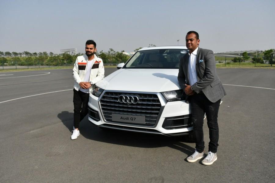 "The Audi brand attributes are sporty, progressive and sophisticated and Virat Kohli embodies all these attributes perfectly. ‘Greatness starts when you don’t stop’ - it’s not only his on field performance but his entire persona that resonates with this innate spirit of the Audi Q7 and we welcome Virat to the Audi Q life. The brand with the four rings attracts achievers that are young or young at heart. We are therefore happy that Virat is our customer as well. This displays our appeal for achievers in the country," said Mr. Rahil Ansari, Head, Audi India. Virat Kohli,Audi Q7,Virat Kohli into the Audi Q family,Virat Kohli,Audi India,Virat Kohli Audi,Audi Virat Kohli,Virat Kohli Audi Q7,Audi Q7 Virat Kohli