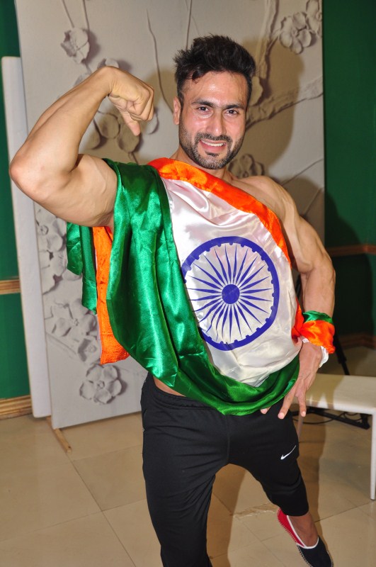 India Men's Physique 2017 Winner Rehaan Raas Dev of Jammu & Kashmir poses at a press conference in Mumbai on May 12, 2017. Rehaan Raas Dev is set to represent India in Mongolia later this month for the Mr Asia 2017 pageant. Rehaan Raas Dev,Mr Asia,Rehaan Raas Dev to represent India at Mr Asia,Mr Asia 2017 pageant,India Men's Physique 2017 Winner,India Men's Physique 2017,India Men's Physique Winner