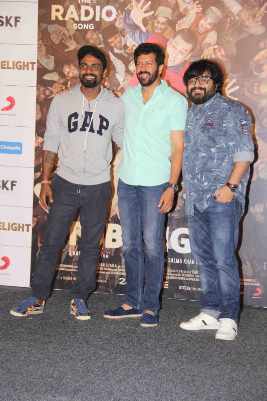 Bollywood choreographer Remo D'souza, filmmaker Kabir Khan and music director Pritam Chakraborty during the launch of first song of the film Tubelight, 'The Radio Song' in Mumbai. Kabir Khan,Remo,Salman Khan,Tubelight,salman khan tubelight,Tubelight first song,Tubelight first song launch,Tubelight first song launch pics,Tubelight first song launch images,Tubelight first song launch stills,Tubelight first song launch pictures,Tubeli