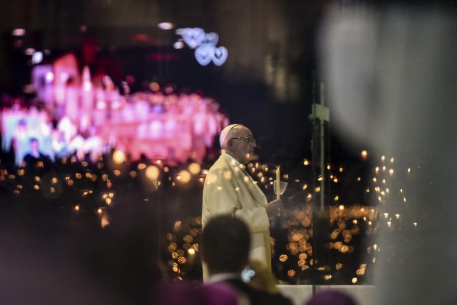 Pope Francis leads the blessing of the candles ceremony from the Chapel of the Apparitions at the Shrine of Our Lady of Fatima in Portugal May 12, 2017. Pope Francis will make two Portuguese shepherd children saints this week, crowning a belief that started with reported visions of the Madonna 100 years ago which have turned the Shrine of Fatima into one of the most famous in Christianity. Pope,Pope Francis,Pope Francis visits Portugal's Shrine of Fatima,Shrine of Fatima,Madonna,Our Lady of Fatima,Lady of Fatima