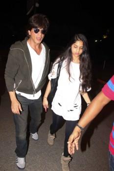 Bollywood actor Shah Rukh Khan spotted with daughter Suhana at airport.