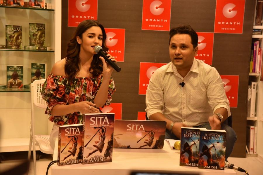 Alia, who is a perfect representation of the modern day women, was very excited to see the different shades of Lady Sita that will be showcased in Amish’s book, ‘Sita Warrior of Mithila’. The actress is known for creating her mark in Bollywood by consciously opting for diverse and powerful roles. Speaking at the trailer launch, Alia said, "It was great to have met Amish for the first time for his new book Sita – Warrior of Mithila’s trailer launch! And I am glad that our first meeting will be so special. I have read the Immortals of Meluha and loved it! I think Amish has a knack of expressing our mythology in a very contemporary modern way! He is bold and brave and I like that about his books! His books are not just books... They are an experience!” Amish,Alia Bhatt,Alia Bhatt launches Sita - Warrior of Mithila,Sita - Warrior of Mithila,Sita - Warrior of Mithila book,Alia Bhatt pics,Alia Bhatt images,Alia Bhatt stills,Alia Bhatt pictures