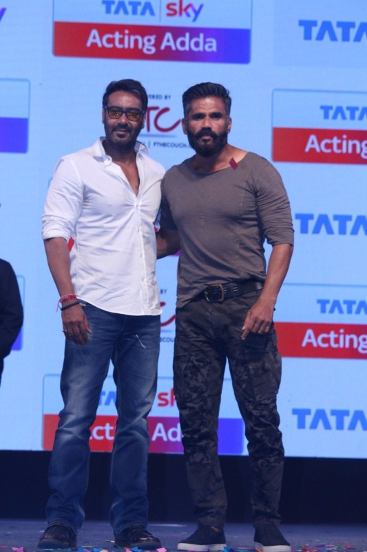 Bollywood Actors Ajay Devgan and Suniel Shetty during the launch of Tata Sky Acting Adda, in Mumbai, on May 16, 2017. Ajay Devgn and Suniel Shetty,Ajay Devgn,Suniel Shetty,Tata Sky Acting Adda,Tata Sky Acting Adda launch,Tata Sky Acting Adda launch pics,Tata Sky Acting Adda launch images,Tata Sky Acting Adda launch photos,Tata Sky Acting Adda launch stills,Tata Sky Actin