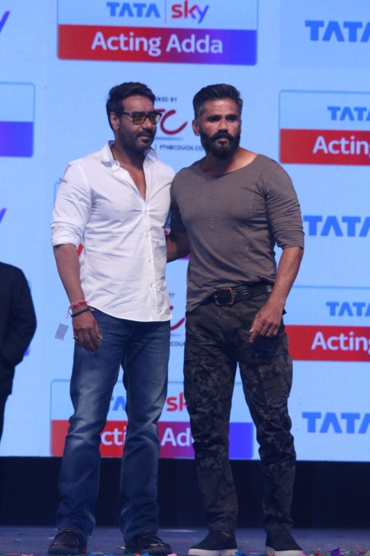 Bollywood Actors Ajay Devgan and Suniel Shetty during the launch of Tata Sky Acting Adda, in Mumbai, on May 16, 2017. Ajay Devgn and Suniel Shetty,Ajay Devgn,Suniel Shetty,Tata Sky Acting Adda,Tata Sky Acting Adda launch,Tata Sky Acting Adda launch pics,Tata Sky Acting Adda launch images,Tata Sky Acting Adda launch photos,Tata Sky Acting Adda launch stills,Tata Sky Actin