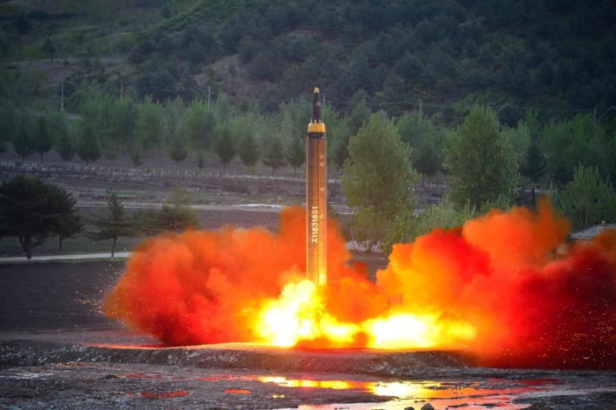 The long-range strategic ballistic rocket Hwasong-12 (Mars-12) is launched during a test. North Korea,North Korea missile launch,missile launch,North Korea's successful missile test-launch,ballistic missile,missile,north korea missile test,Kim Jong Un