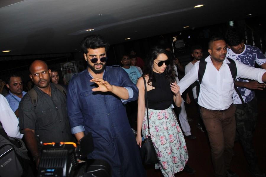 Bollywood actor Arjun Kapoor and actress Shraddha Kapoor, who will be seen together in 'Half Girlfriend', were recently spotted at the airport. Arjun Kapoor and Shraddha Kapoor,Arjun Kapoor,Shraddha Kapoor,Arjun Kapoor and Shraddha Kapoor spotted at airport,Arjun Kapoor spotted at airport,Shraddha Kapoor spotted at airport,Arjun Kapoor at airport,Shraddha Kapoor at airport