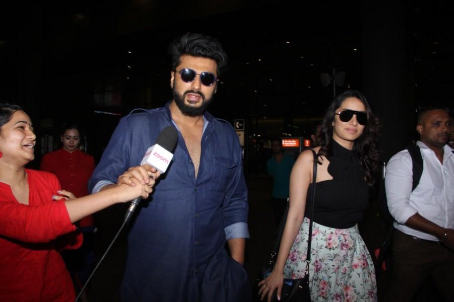 Bollywood actor Arjun Kapoor and actress Shraddha Kapoor, who will be seen together in 'Half Girlfriend', were recently spotted at the airport. Arjun Kapoor and Shraddha Kapoor,Arjun Kapoor,Shraddha Kapoor,Arjun Kapoor and Shraddha Kapoor spotted at airport,Arjun Kapoor spotted at airport,Shraddha Kapoor spotted at airport,Arjun Kapoor at airport,Shraddha Kapoor at airport