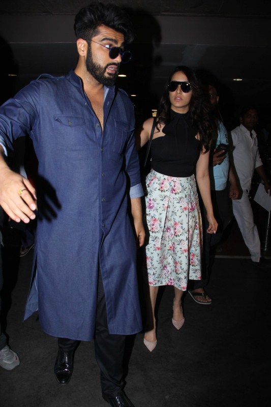 Bollywood actor Arjun Kapoor and actress Shraddha Kapoor, who will be seen together in 'Half Girlfriend', were recently spotted at the airport. Arjun Kapoor and Shraddha Kapoor,Arjun Kapoor,Shraddha Kapoor,Arjun Kapoor and Shraddha Kapoor spotted at airport,Arjun Kapoor spotted at airport,Shraddha Kapoor spotted at airport,Arjun Kapoor at airport,Shraddha Kapoor at airport