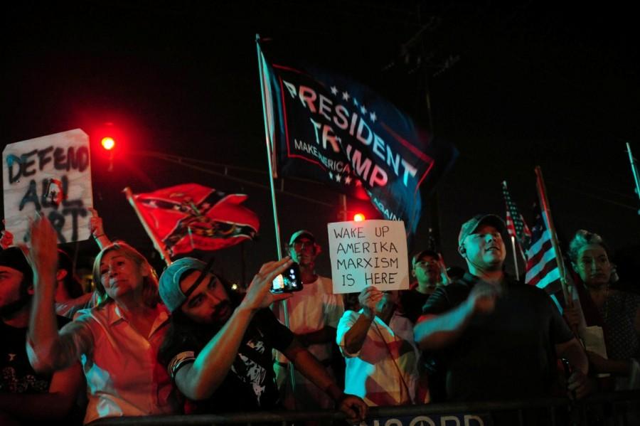 Protesters demonstrate as a crew works to remove a monument of Confederate General P.G.T. Beauregard. Statue removed,Another Confederate statue,Confederate statue,P.G.T. Beauregard,New Orleans