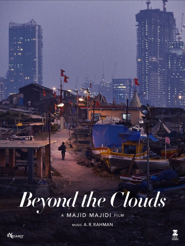 There's a slum in the foreground and high rises and skyscrapers in the background. The second poster of Iranian filmmaker Majid Majidi's India-set film "Beyond The Clouds" -- launched at the Cannes Film Festival here on Thursday -- showcases the spirit of Mumbai in all its glory. After launching the poster at the Berlin Film Festival earlier this year, the producers -- Zee Studios and Eyecandy Films -- chose the celebrated Cannes movie gala to bring out a fresh look into the film. The first look saw Ishaan -- Shahid Kapoor's younger brother -- with birds at the seaside in Mumbai, and the new poster shows a different side to the buzzing city. Starring Ishaan with actress Malavika Mohannan in lead roles, the story of "Beyond The Clouds" is woven around human values and relationships. It is centered around a brother-sister relationship, and Majidi has had a busy schedule shooting the movie in key locations of Mumbai. Mumbai slums,Beyond The Clouds,Beyond The Clouds poster,Beyond The Clouds first look,Beyond The Clouds first look poster,Majid Majidi,Cannes Film Festival,Cannes Film Festival 2017