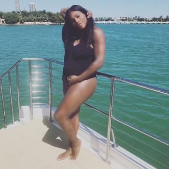 American tennis player Serena Williams flaunts her baby bump in her swimsuit.