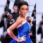 Canadian fashion model Winnie Harlow looks sensational in dramatic sapphire blue gown at Cannes Film Festival.