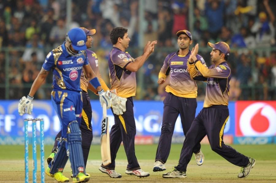 Robin Uthappa (1) did not last long, being trapped plumb by Bumrah, while trying to flick across the line. After six overs, KKR could muster just 25/3, and captain Gambhir lost his wicket five balls into the seventh over. The southpaw was looked good before playing against the turn off Karn for Hardik Pandya to pouch the ball at deep midwicket. Keeping veteran tweaker Harbhajan Singh on the bench, Karn vindicated his captain's faith in him by taking the wicket of Colin de Grandhomme in the next delivery, pinging the New Zealander on his backfoot for an easy leg before decision. Mumbai Indians beats Kolkata Knight Riders,Mumbai Indians,Kolkata Knight Riders,IPL 2017,IPL,Krunal Pandya
