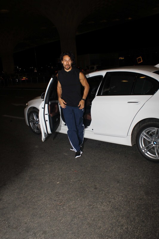Bollywood actor Tiger Shroff spotted at Mumbai airport on May 19, 2017. Tiger Shroff,Sonam Kapoor,Tiger Shroff and Sonam Kapoor,Tiger Shroff spotted at airport,Sonam Kapoor spotted at airport,Tiger Shroff at airport,Sonam Kapoor at airport