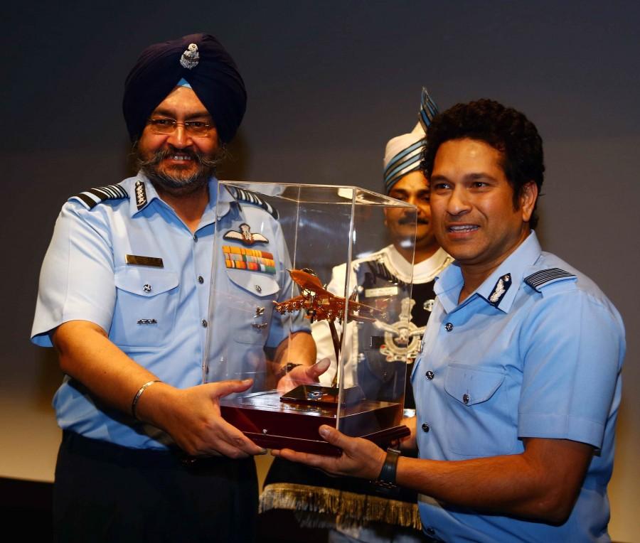 Legendary cricketer Sachin Tendulkar during a special screening of his film 'Sachin: A Billion Dreams' for Air Force at Air Force Auditorium, Subroto Park in New Delhi on May 20, 2017. Also seen Indian Air Force Chief BS Dhanoa. Legendary cricketer Sachin Tendulkar,Sachin Tendulkar,Sachin: A Billion Dreams special screening,Sachin: A Billion Dreams special screening for armed forces,Sachin: A Billion Dreams special screening pics,Sachin: A Billion Dreams special screening images