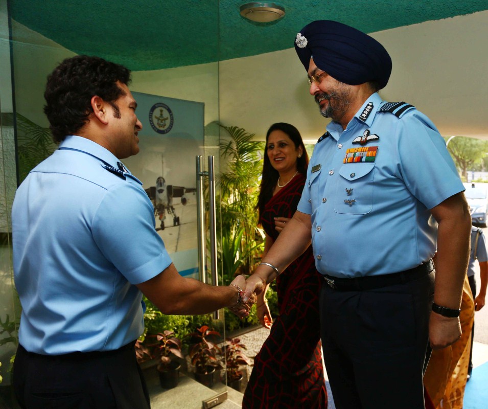 Legendary cricketer Sachin Tendulkar during a special screening of his film 'Sachin: A Billion Dreams' for Air Force at Air Force Auditorium, Subroto Park in New Delhi on May 20, 2017. Also seen Indian Air Force Chief BS Dhanoa. Legendary cricketer Sachin Tendulkar,Sachin Tendulkar,Sachin: A Billion Dreams special screening,Sachin: A Billion Dreams special screening for armed forces,Sachin: A Billion Dreams special screening pics,Sachin: A Billion Dreams special screening images