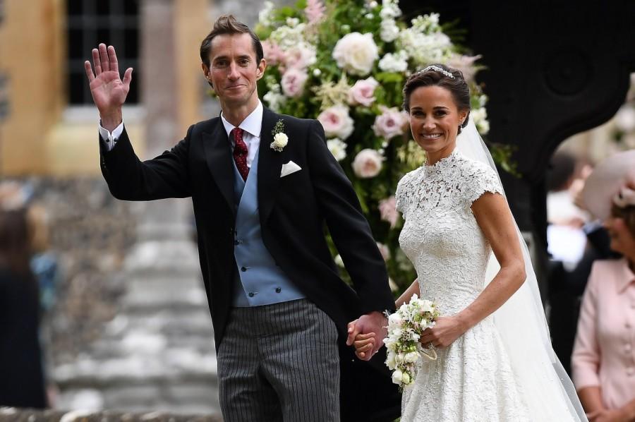 Pippa Middleton and her new husband James Matthews smile following their wedding ceremony at St Mark's Church in Englefield. Pippa Middleton marries James Matthews,Pippa Middleton,James Matthews,Pippa Middleton weds James Matthews,Pippa Middleton and James Matthews,Pippa Middleton and James Matthews marriage pics,Pippa Middleton and James Matthews marriage images,Pippa Middle