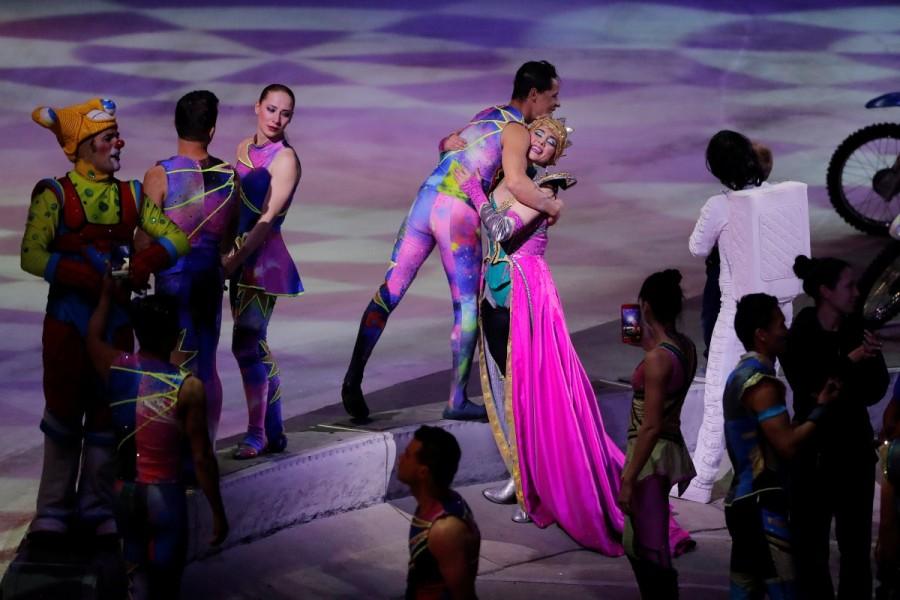 Performers embrace after the last show of the Ringling Bros. and Barnum & Bailey circus at Nassau Coliseum in Uniondale, New York. Curtain closes on Ringling Brothers circus,Ringling Brothers circus,Ringling Bros and Barnum & Bailey Circus