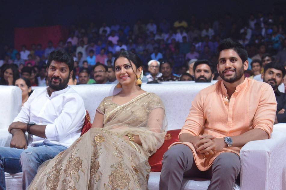 Telugu movie Rarandoi Veduka Chuddam audio launch event held in Hyderabad. Celebs like Naga Chaitanya, Rakul Preet Singh, Akkineni Nagarjuna and others graced the event. Naga Chaitanya,Rakul Preet Singh,Akkineni Nagarjuna,Rarandoi Veduka Chuddam,Rarandoi Veduka Chuddam audio launch,Rarandoi Veduka Chuddam audio launch pics,Rarandoi Veduka Chuddam audio launch images,Rarandoi Veduka Chuddam audio launch stills,Rarandoi Ved