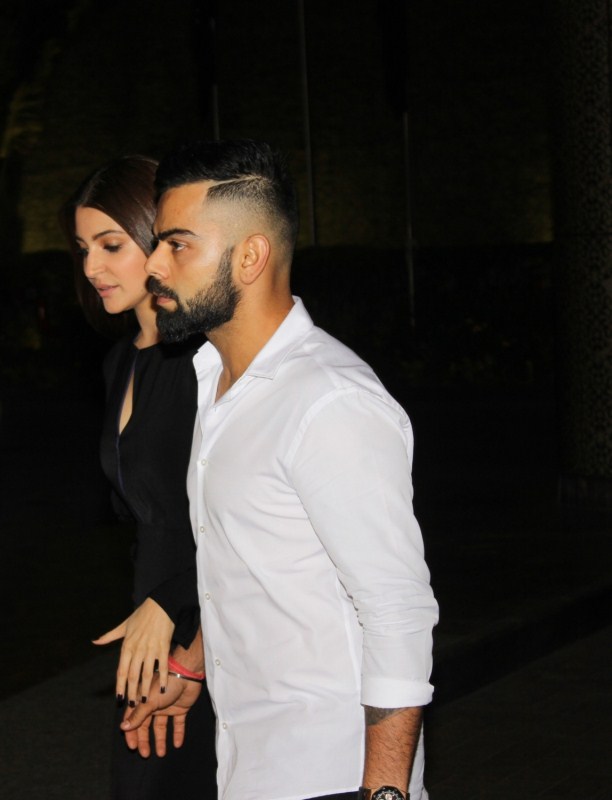 Indian cricketer Virat Kohli and actress Anushka Sharma during the engagement ceremony of Zaheer Khan and Sagarika Ghatge, in Mumbai, on May 23, 2017. Virat Kohli,Anushka Sharma,Yuvraj Singh,Rohit Sharma,Sachin Tendulkar,Zaheer Khan and Sagarika Ghatge,Zaheer Khan,Sagarika Ghatge,Zaheer Khan and Sagarika Ghatge engagement,Zaheer Khan engagement,Sagarika Ghatge engagement,Zaheer Khan and Sagarika Ghatge
