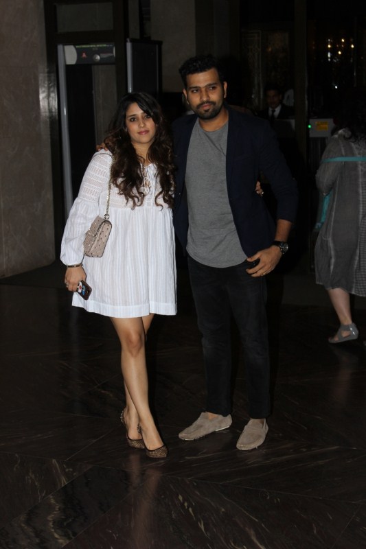 Indian cricketer Rohit Sharma with his wife Ritika Sajdeh arrive to attend the engagement ceremony of Zaheer Khan and Sagarika Ghatge, in Mumbai, on May 23, 2017. Virat Kohli,Anushka Sharma,Yuvraj Singh,Rohit Sharma,Sachin Tendulkar,Zaheer Khan and Sagarika Ghatge,Zaheer Khan,Sagarika Ghatge,Zaheer Khan and Sagarika Ghatge engagement,Zaheer Khan engagement,Sagarika Ghatge engagement,Zaheer Khan and Sagarika Ghatge