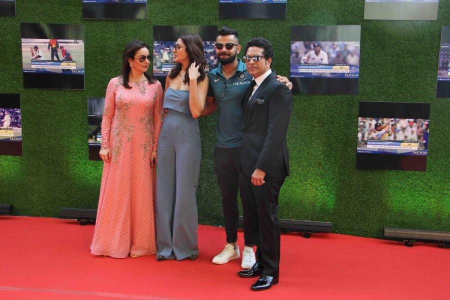 Former Indian cricket player Sachin Tendulkar along with his wife Anjali Tendulkar, actress Anushka Sharma and with player Virat Kohli during the premiere of film Sachin: A Billion Dreams in Mumbai, on May 24, 2017. Virat Kohli and Anushka Sharma,Anushka Sharma and Virat Kohli,Anushka Sharma,Virat Kohli,Sachin: A Billion Dreams,Sachin: A Billion Dreams premiere show,Sachin: A Billion Dreams premiere show pics,Sachin: A Billion Dreams premiere show images,Sachin: A Bi