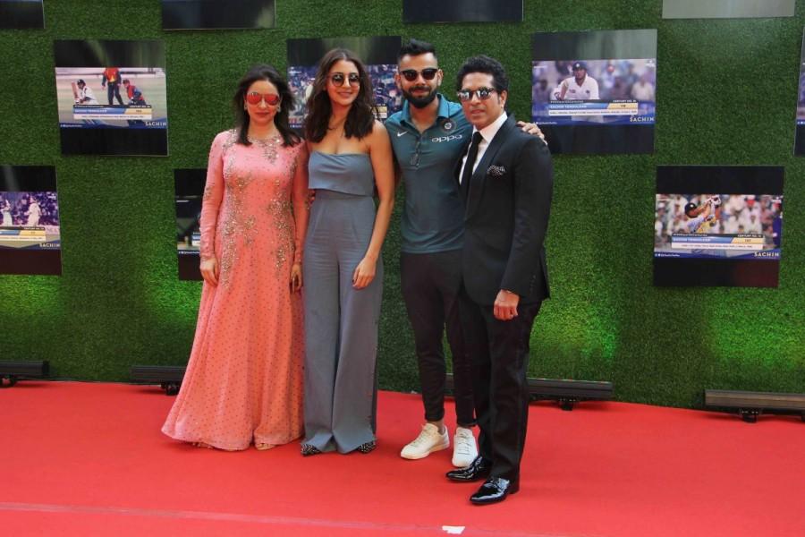 Former Indian cricket player Sachin Tendulkar along with his wife Anjali Tendulkar, actress Anushka Sharma and with player Virat Kohli during the premiere of film Sachin: A Billion Dreams in Mumbai, on May 24, 2017. Virat Kohli and Anushka Sharma,Anushka Sharma and Virat Kohli,Anushka Sharma,Virat Kohli,Sachin: A Billion Dreams,Sachin: A Billion Dreams premiere show,Sachin: A Billion Dreams premiere show pics,Sachin: A Billion Dreams premiere show images,Sachin: A Bi
