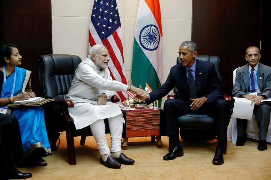 U.S. President Barack Obama holds a bilateral meeting with India's Prime Minister Narendra Modi alongside the ASEAN Summits in Vientiane, Laos September 8, 2016. Narendra Modi,PM Narendra Modi,Modi,PM Modi,3 yrs of Narendra Modi govt,Narendra Modi government turns 3,NaMo,NaMo 3 years