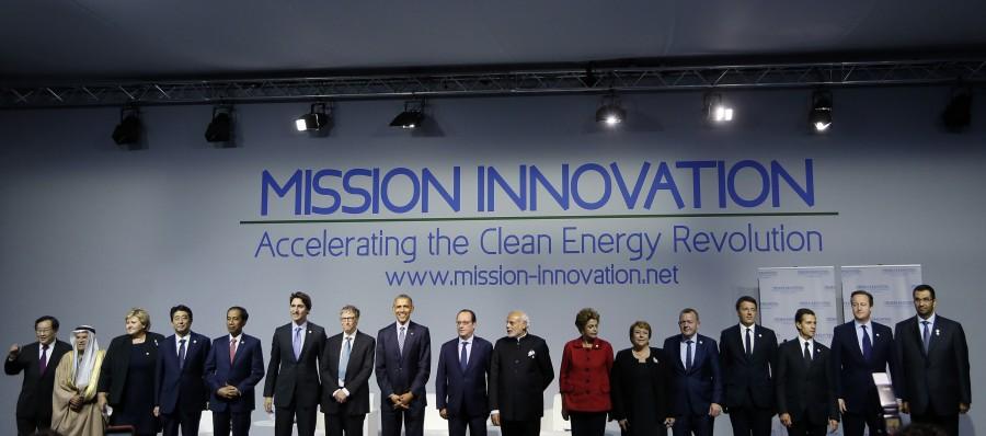 World leaders including U.S. President Barack Obama (8thL), French President Francois Hollande (C), Indian Prime Minister Narendra Modi (8thR), and Microsoft co-founder Bill Gates (7thL) attend a meeting to launch the 'Mission Innovation: Accelerating the Clean Energy Revolution' at the World Climate Change Conference 2015 (COP21) in Le Bourget, near Paris, France, November 30, 2015. Narendra Modi,PM Narendra Modi,Modi,PM Modi,3 yrs of Narendra Modi govt,Narendra Modi government turns 3,NaMo,NaMo 3 years