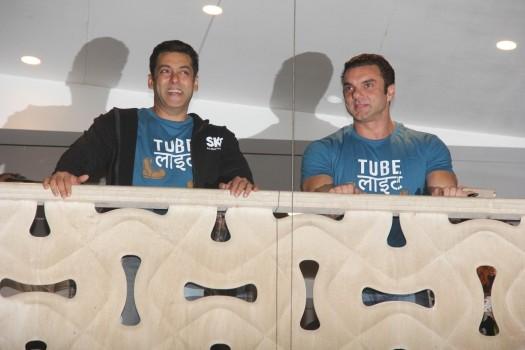 Tubelight actors Salman Khan and Sohail Khan greet fans from their balcony from Galaxy Apartments, in Mumbai on May 25, 2017.