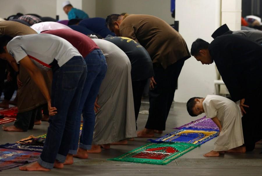Muslims perform tarawih prayers to mark the start of Ramadan at a mosque in Singapore May 27, 2017. Ramadan,Ramadan 2017,ramadan 2017 in india,Happy Ramadan,Muslims begin fasting,holy month of Ramadan,fasting