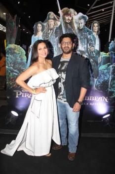 Bollywood actor Arshad Warsi along with his wife Maria Goretti during the screening of Hollywood film Pirates of The Caribbean: Salazar's Revenge, in Mumbai on May 25, 2017.